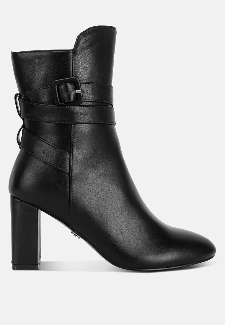 Cobra Buckle Strap Embellished Boots In Black