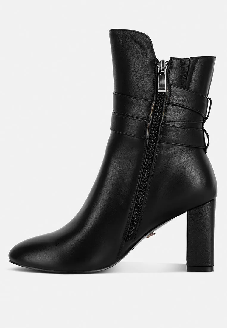 Cobra Buckle Strap Embellished Boots In Black