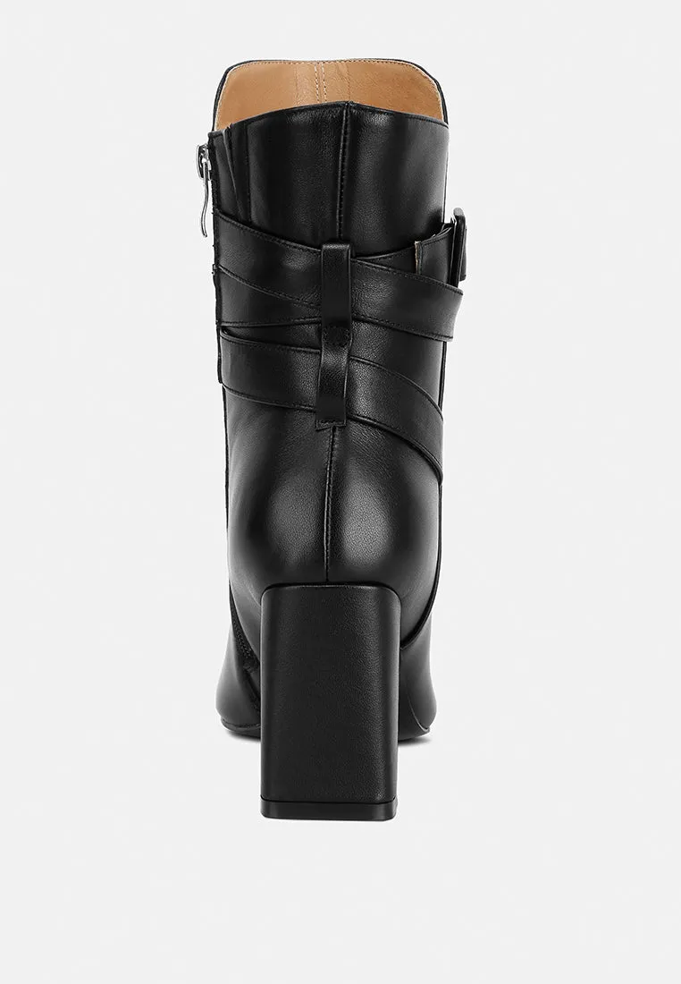 Cobra Buckle Strap Embellished Boots In Black